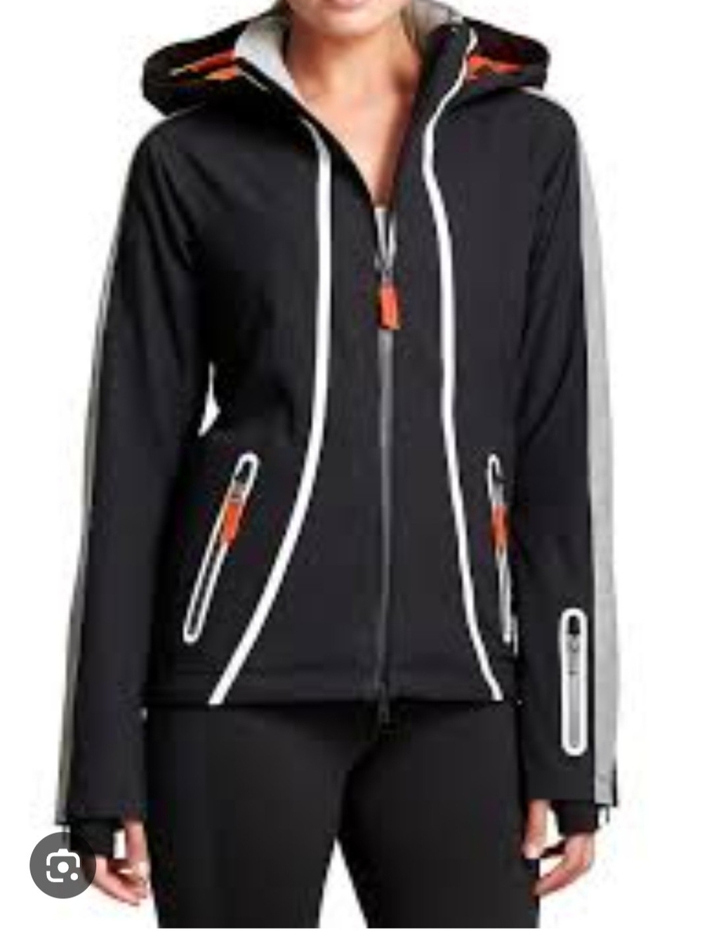 Athleta Black Ski Jacket with White Trim and Orange Accents